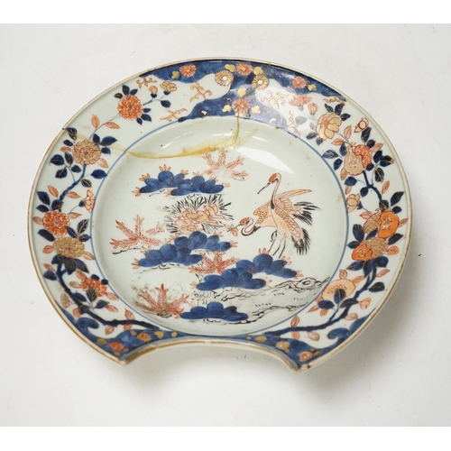 1320 - A Japanese Arita âcranes and chicksâ barber's bowl, early 18th century, in Imari palette, 27.5cm... 