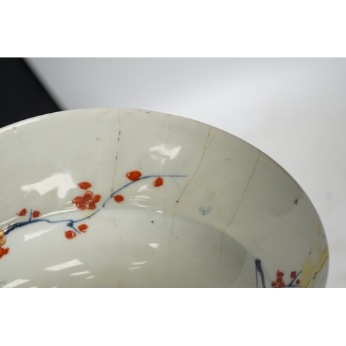 1320 - A Japanese Arita âcranes and chicksâ barber's bowl, early 18th century, in Imari palette, 27.5cm... 