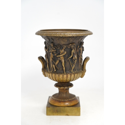 1322 - A mid 19th century bronze campana urn with classical figures, 22cm high. Condition - good