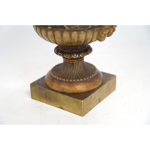 1322 - A mid 19th century bronze campana urn with classical figures, 22cm high. Condition - good