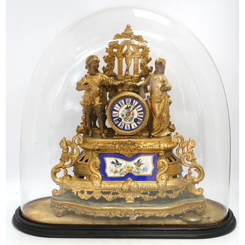 1329 - A large gilt metal figural mantel clock with floral porcelain dial and panels, under a glass dome, 5... 