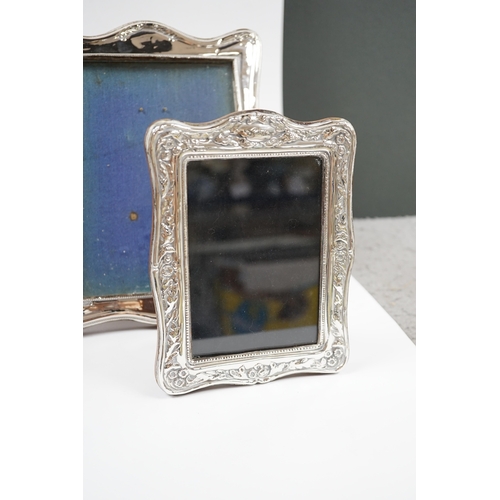 1841 - A George V silver mounted photograph frame, Birmingham, 1917, 25cm, together with a modern silver mo... 