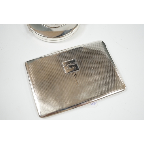 1844 - A George VI engine turned silver cigarette case, 11.5cm, together with a Spanish white metal compact... 