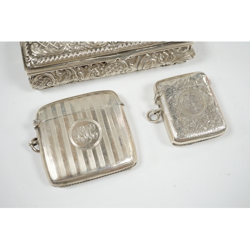 1850 - Two early 20th century silver vesta cases and an Edwardian repousse silver trinket box, 11cm. Condit... 