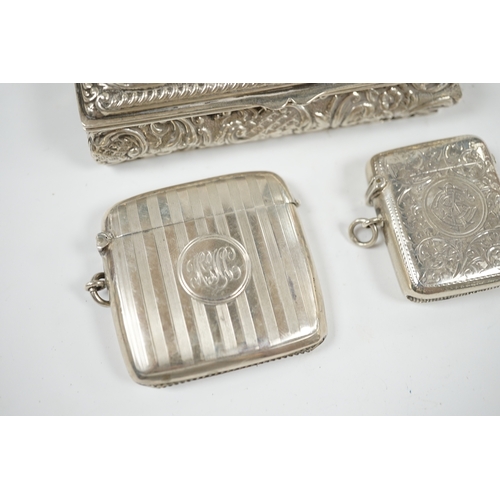 1850 - Two early 20th century silver vesta cases and an Edwardian repousse silver trinket box, 11cm. Condit... 