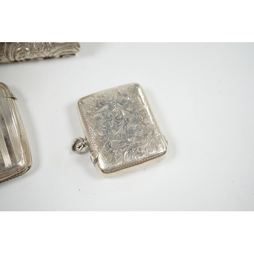 1850 - Two early 20th century silver vesta cases and an Edwardian repousse silver trinket box, 11cm. Condit... 