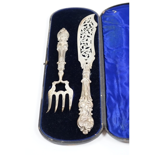 1875 - A cased pair of Victorian silver fish servers, maker H&I, Birmingham, 1863, knife 32.1cm. Condition ... 