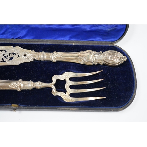 1875 - A cased pair of Victorian silver fish servers, maker H&I, Birmingham, 1863, knife 32.1cm. Condition ... 