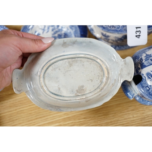 431 - A mixed collection of Willow pattern blue and white dinnerware, including four tureens and covers, p... 