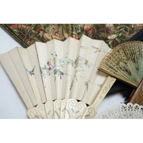 464 - A black ostrich feather and tortoiseshell fan and four others including a carved bone and floral pai... 