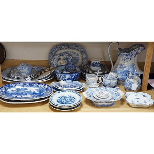 465 - A collection of mixed blue and white dinnerware including Masons Ironstone, mostly plates and jugs. ... 