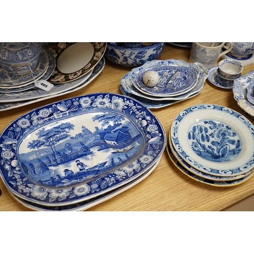 465 - A collection of mixed blue and white dinnerware including Masons Ironstone, mostly plates and jugs. ... 