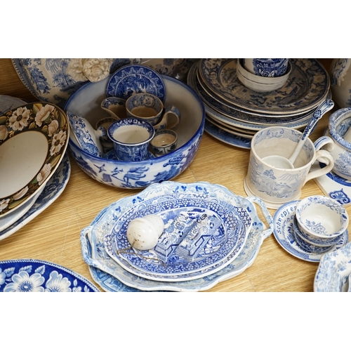 465 - A collection of mixed blue and white dinnerware including Masons Ironstone, mostly plates and jugs. ... 