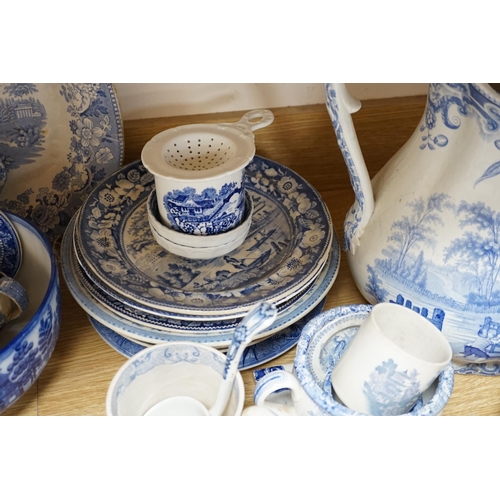 465 - A collection of mixed blue and white dinnerware including Masons Ironstone, mostly plates and jugs. ... 