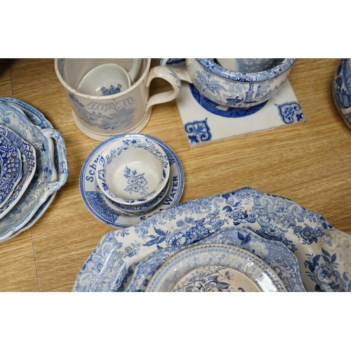 465 - A collection of mixed blue and white dinnerware including Masons Ironstone, mostly plates and jugs. ... 