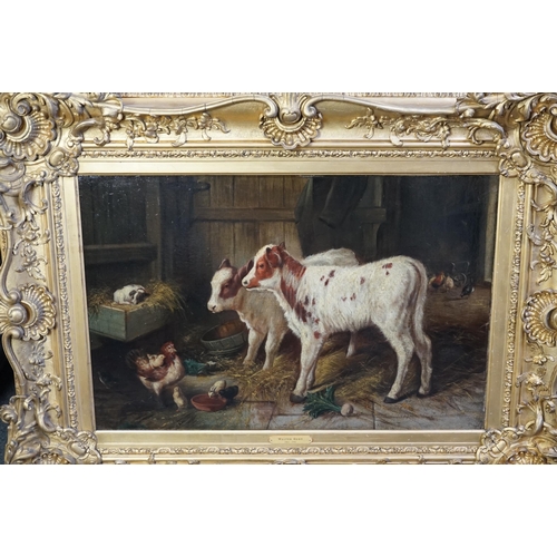 39 - Walter Hunt (1861-1941) Calves, a puppy and poultry in a barnoil on canvas50 x 75cm... 