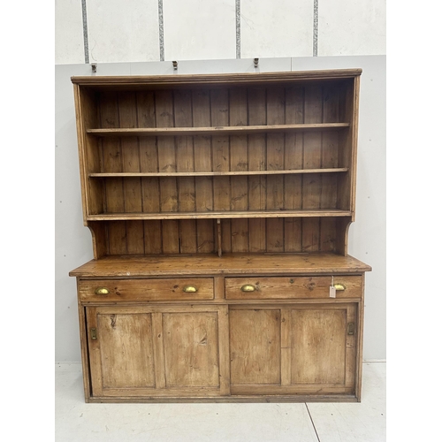 11 - A Victorian pine dresser with boarded rack, width 189cm, depth 51cm, height 216cm. Condition - poor ... 