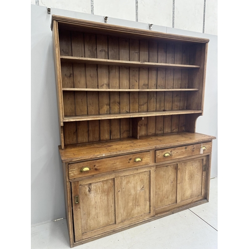 11 - A Victorian pine dresser with boarded rack, width 189cm, depth 51cm, height 216cm. Condition - poor ... 