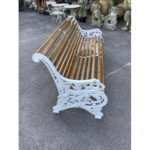 130 - A Victorian style Coalbrookdale design cast iron garden bench (fully restored with varnished oak sla... 