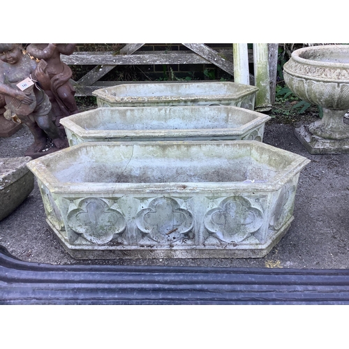 140 - A set of three reconstituted stone hexagonal garden planters, width 89cm, depth 32cm, height 28cm. C... 