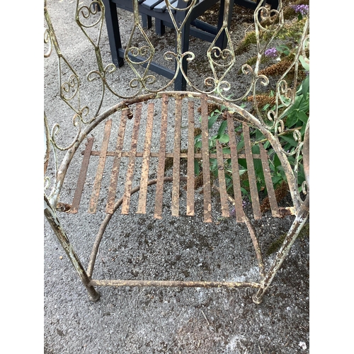 152 - A painted wrought iron garden arbour seat, width 203cm, depth 55cm, height 250cm. Condition - poor... 