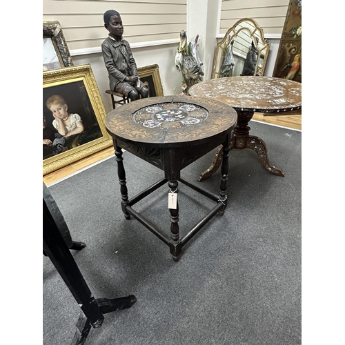 161 - An early 20th century circular carved beech and cloisonne topped occasional table, on oak underframe... 