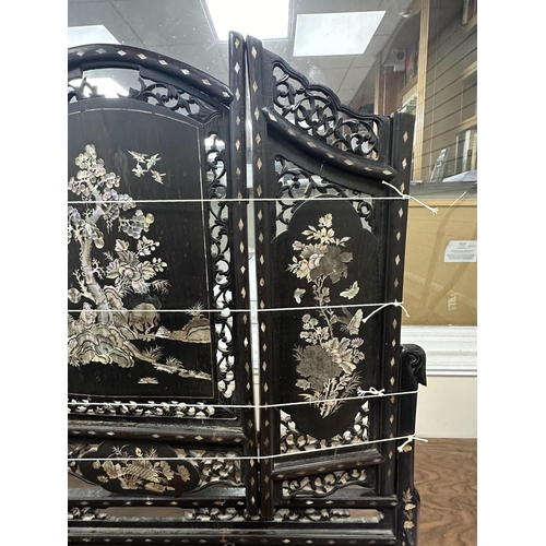 172 - A Chinese mother of pearl inlaid hardwood table screen, width 78cm, height 86cm. Condition - poor to... 