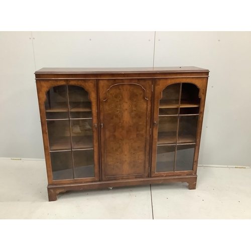 24 - A Queen Anne Revival walnut bookcase, width 133cm, depth 30cm, height 109cm. Condition - poor