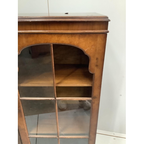 24 - A Queen Anne Revival walnut bookcase, width 133cm, depth 30cm, height 109cm. Condition - poor