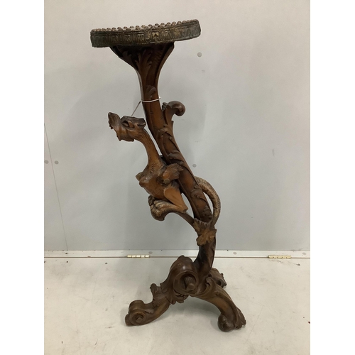 25 - An Italian pine and carved walnut torchere with dragon column, height 100cm. Condition - fair