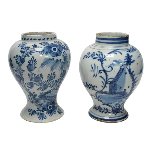 252 - Two 18th century delft blue and white baluster vases, 18.5cm