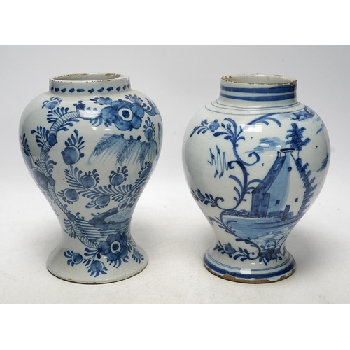 252 - Two 18th century delft blue and white baluster vases, 18.5cm