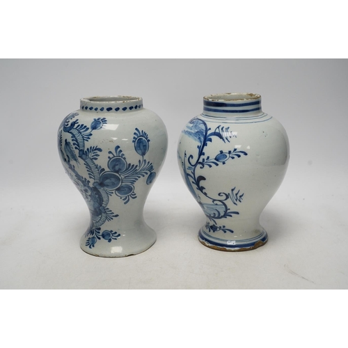 252 - Two 18th century delft blue and white baluster vases, 18.5cm