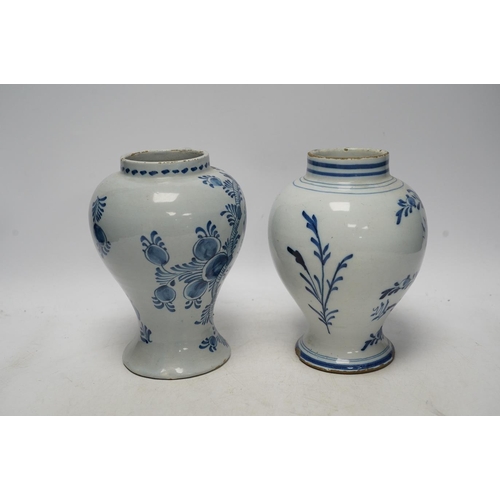 252 - Two 18th century delft blue and white baluster vases, 18.5cm