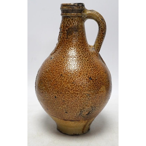 255 - A 17th century Rhenish saltglazed Bellarmine, 23cm. Condition - commensurate with age