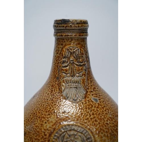 255 - A 17th century Rhenish saltglazed Bellarmine, 23cm. Condition - commensurate with age