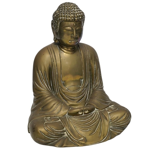 262 - A cast brass figure of Buddha, 27cm high. Condition - fair to good