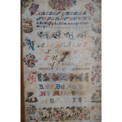 270 - A 19th century framed alphabet sampler worked by M. Edlacher, overall 114cm high. Condition - poor... 