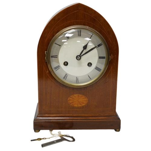 273 - An Edwardian inlaid mahogany eight day lancet topped mantel clock, with key, 31cm high. Condition - ... 