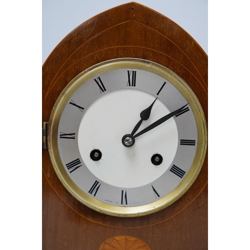 273 - An Edwardian inlaid mahogany eight day lancet topped mantel clock, with key, 31cm high. Condition - ... 