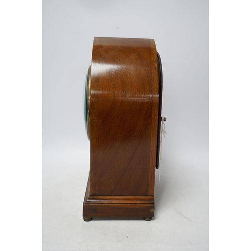 273 - An Edwardian inlaid mahogany eight day lancet topped mantel clock, with key, 31cm high. Condition - ... 