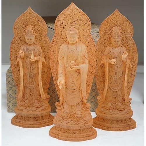 274 - A set of three large Chinese glass figures of Bodhisattva, rust finish, with cases, 42cm high. Condi... 