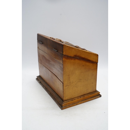 280 - A Victorian carved fruitwood stationery box, 25cm tall. Condition - poor to fair