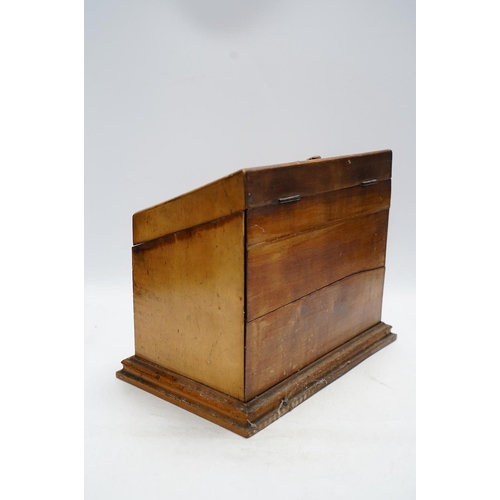 280 - A Victorian carved fruitwood stationery box, 25cm tall. Condition - poor to fair