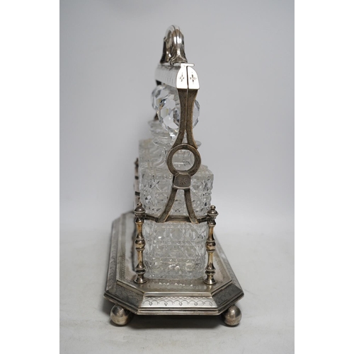 296 - A silver plated three decanter tantalus with unusual duo swing handle locking mechanism, with key, 3... 