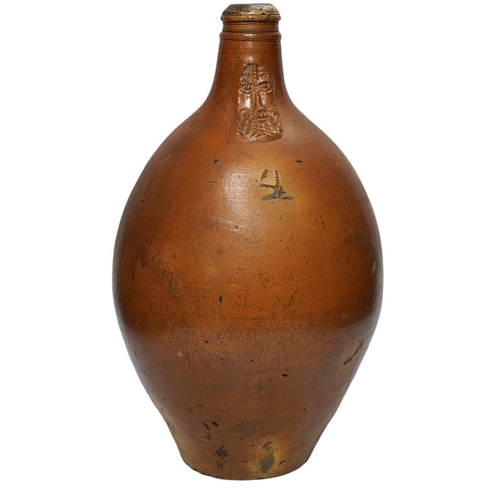 304 - An 18th century German large salt glazed Bellarmine, 45cm. Condition - commensurate with age