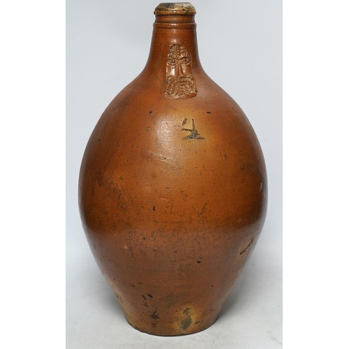 304 - An 18th century German large salt glazed Bellarmine, 45cm. Condition - commensurate with age