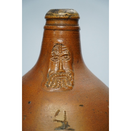 304 - An 18th century German large salt glazed Bellarmine, 45cm. Condition - commensurate with age