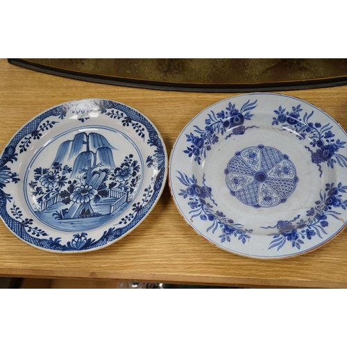 306 - Five various delft dishes, largest 37cm diameter. Condition - poor to fair