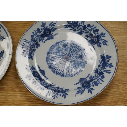 306 - Five various delft dishes, largest 37cm diameter. Condition - poor to fair